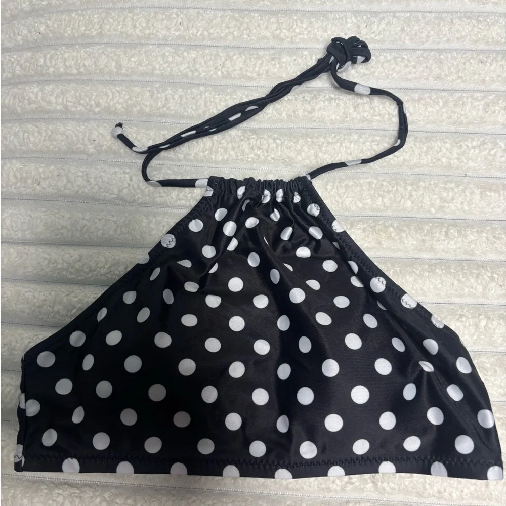 Stylish Polka Dot Bikini Top with Vibrant Red Bottoms